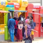 Ghanaian customer using a smartphone for mobile money payment