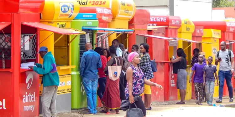 Ghanaian customer using a smartphone for mobile money payment