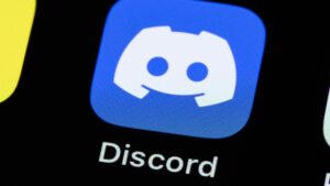 Discord app on smartphone with age verification notice